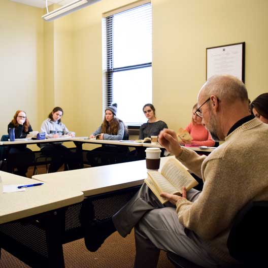 Students in discussion during Dr. George Nicholas' class