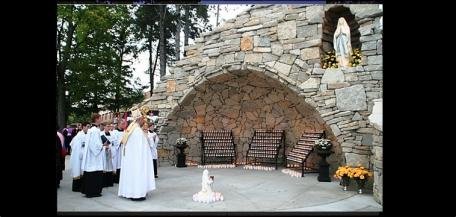Abbot James leads procession to Mary's grotto