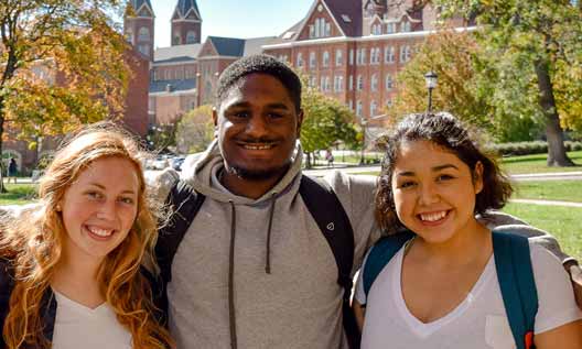 Students posing for a photo on campus