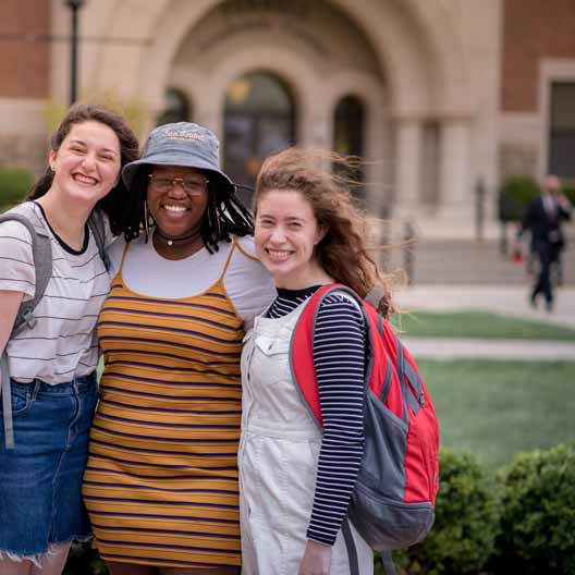 Students posing for a photo on campus