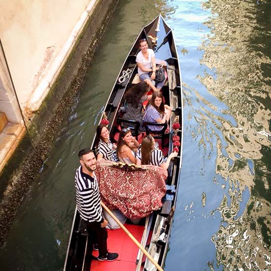 Students on a gondola in Venice, Italy