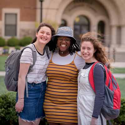 Students posing for a photo on campus