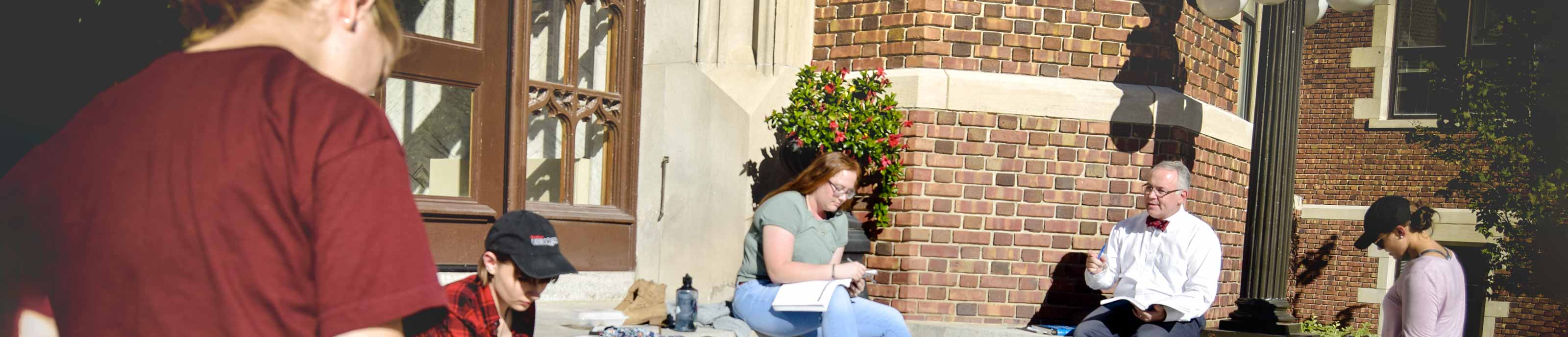 Dr. Mulholland teaches his class outside