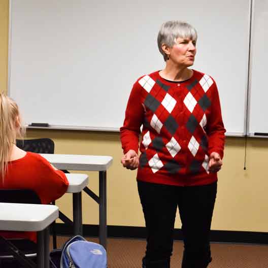 Mary Flynn teaches class