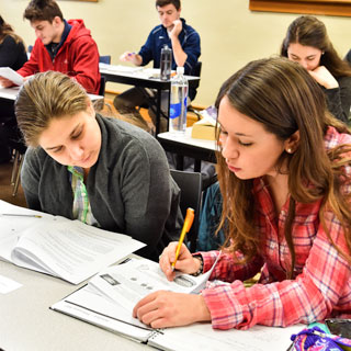 Students working on an assignment in class together