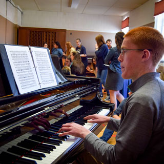 Student playing piano