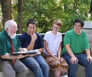 Dr. Macierowski with students outside