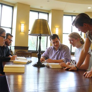 Dr. Spiering with students in the FAC rotunda