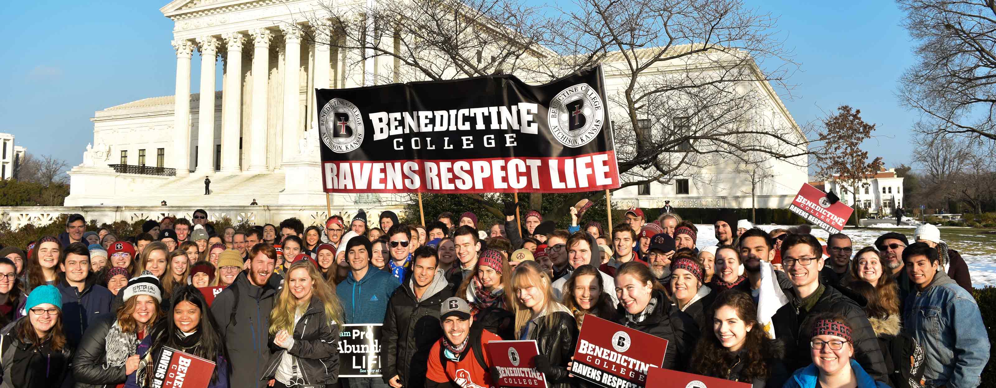 Students on the March for Life stand in front of the Supreme Court building in Washington, D.C.
