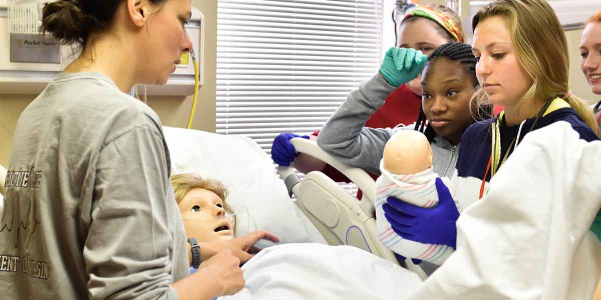 BCYC Immersion participants learn how to care for a woman in labor and for her newborn child