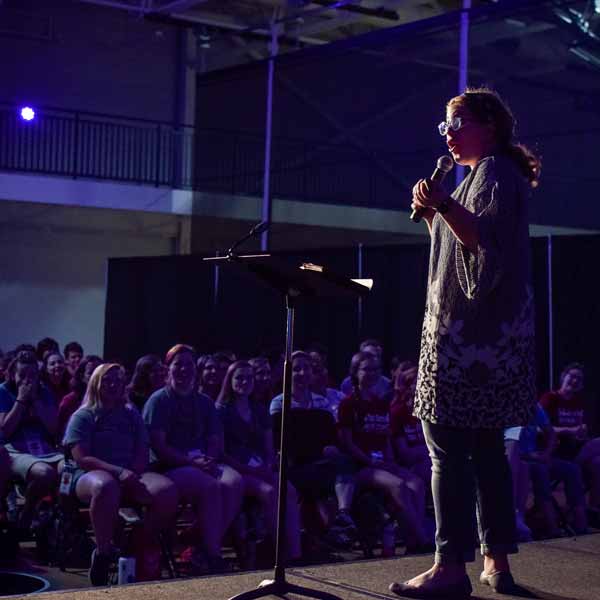 A speaker on stage at BCYC Encounter