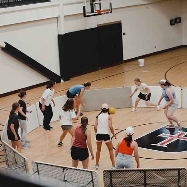 BCYC participants throw a giant beach ball over a net