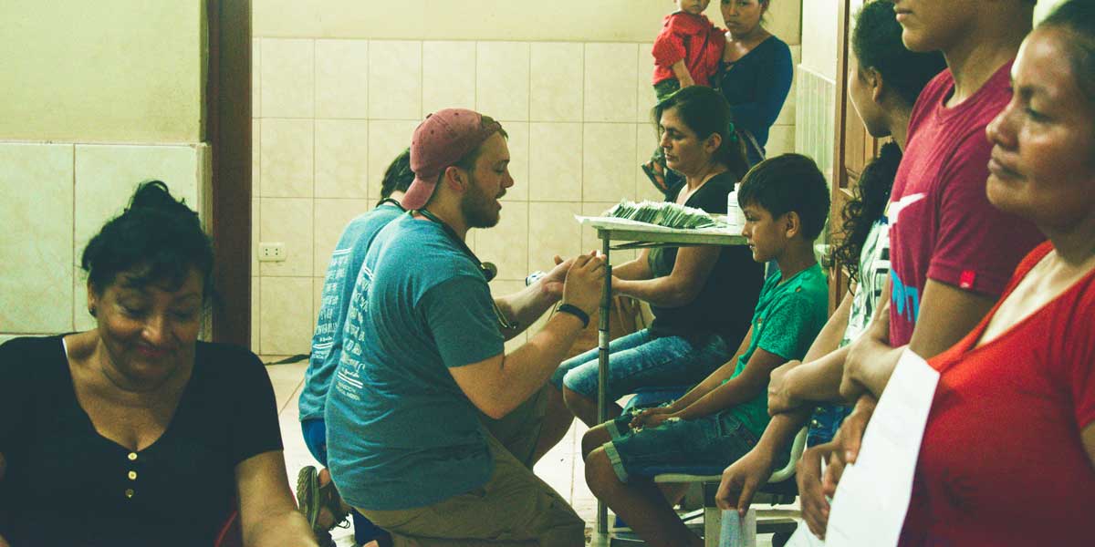 Missionaries providing medical assistance