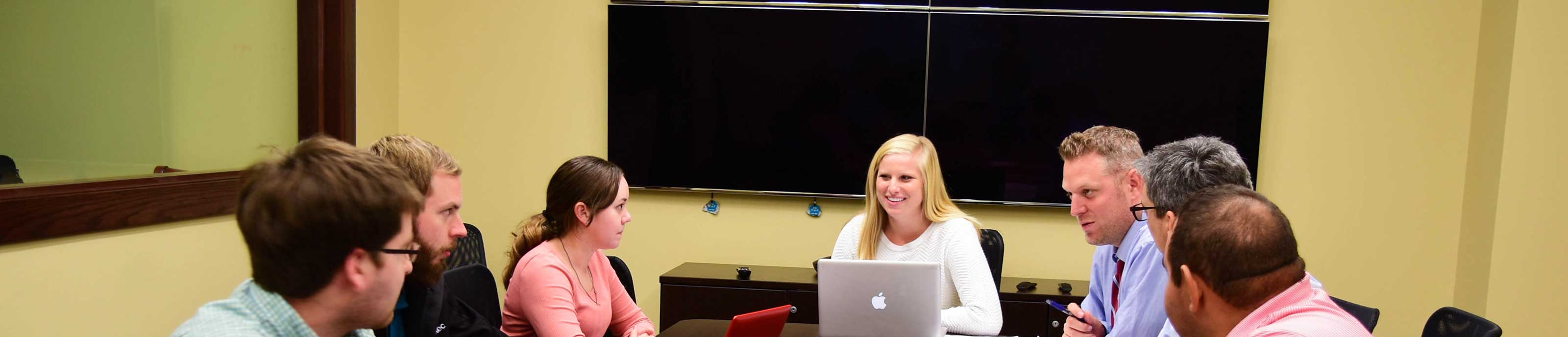 MBA students in class in the Thompson Trading Room