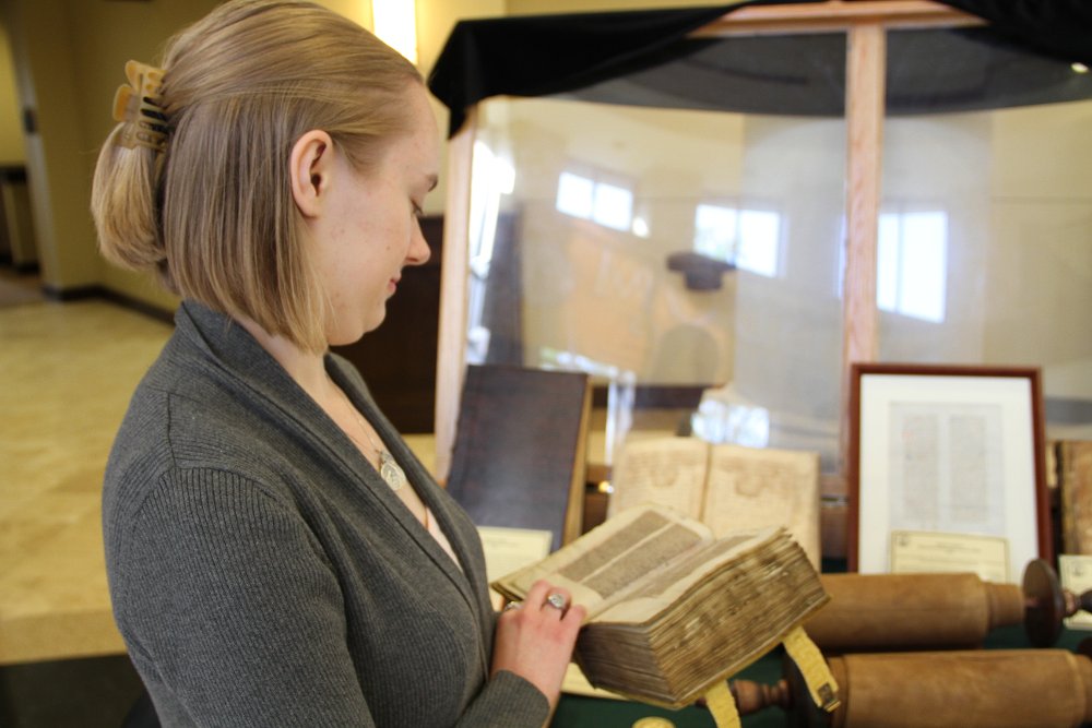 A Student Looks over a Classic Document