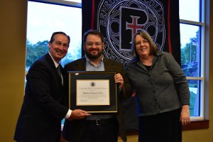 President Stephen Minnis and Dean Kimberly Shankman with 2017 Educator of the Year Matt Ramsey