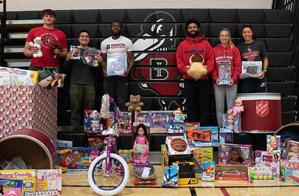 Benedictine Students with more than 200 toys they collected for the Salvation Army Angel Tree Program.