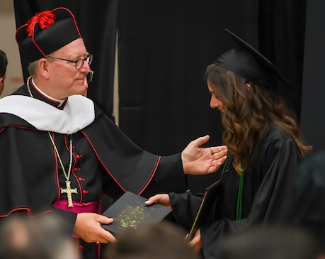 Bishop Barron Helped Distribute Bibles to all the 2022 Graduates