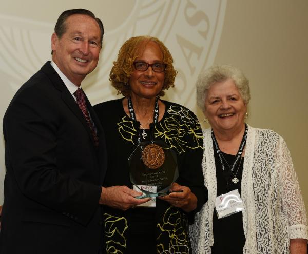 President Stephen Minnis, honoree Portia Maultsby, and Prioress S. Esther Fangman at the Alumni Banquet.