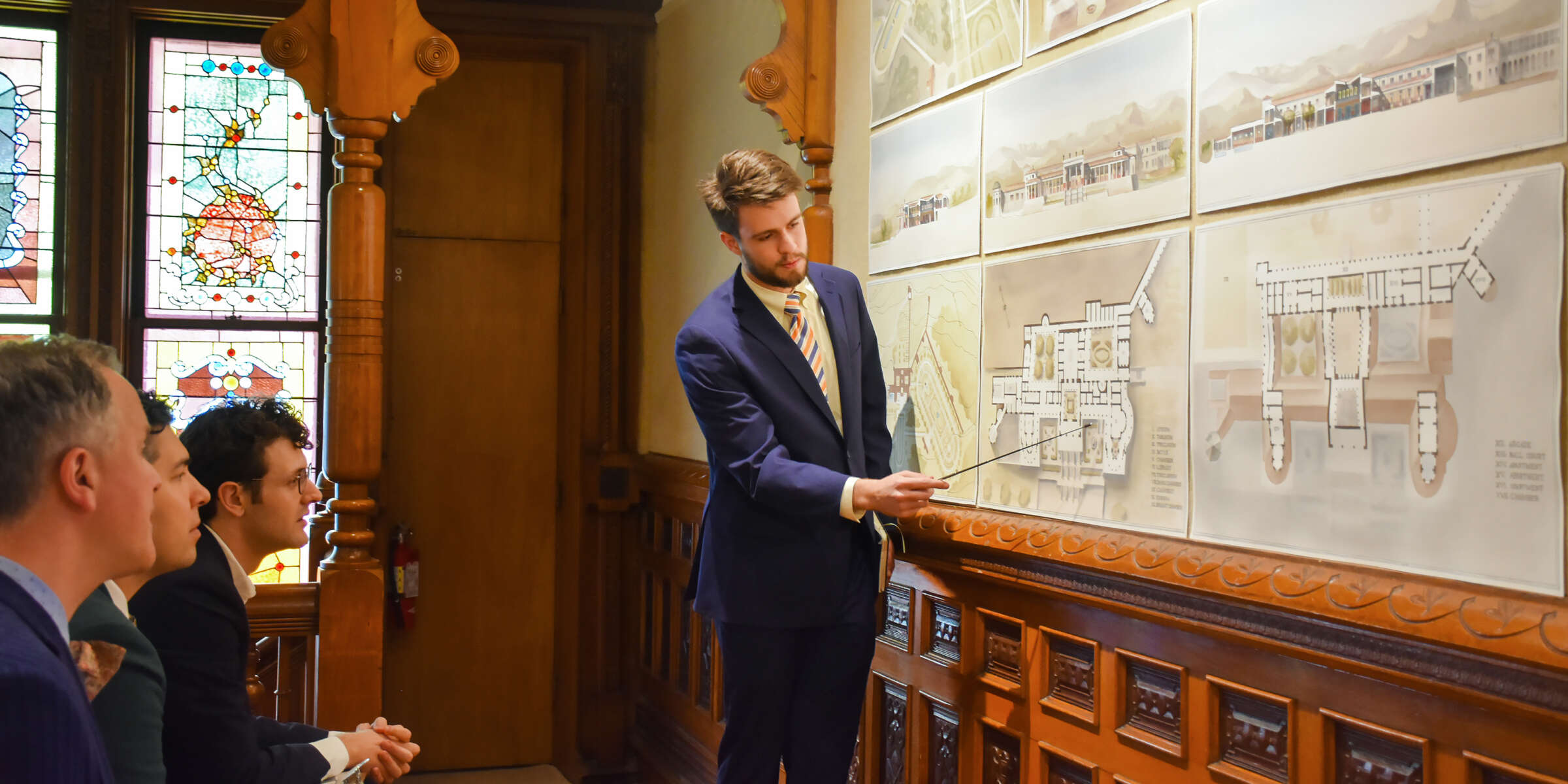 Students working at drafting tables in Architecture class