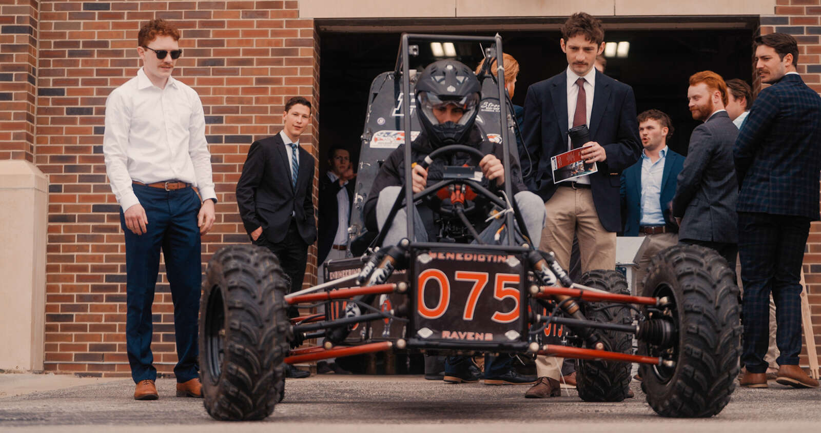 Students working with a buggy