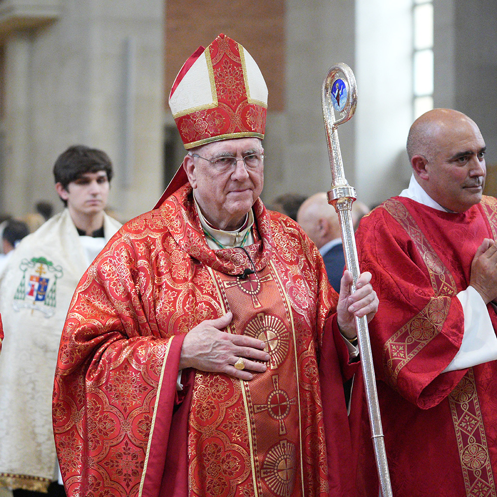 Archbishop Naumann processes out of Baccalaureate Mass
