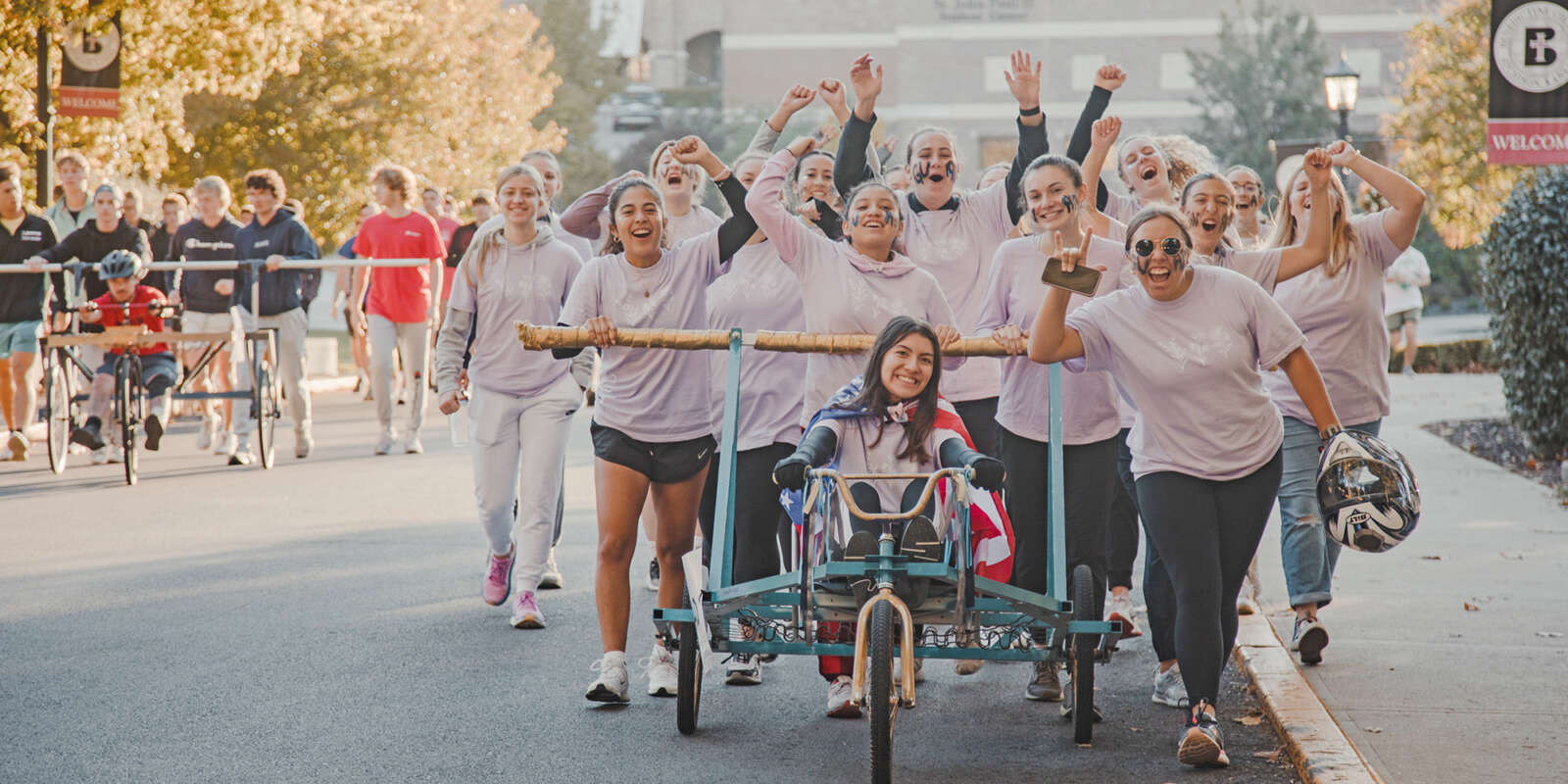 Students at the Bed Races during Homecoming Weekend