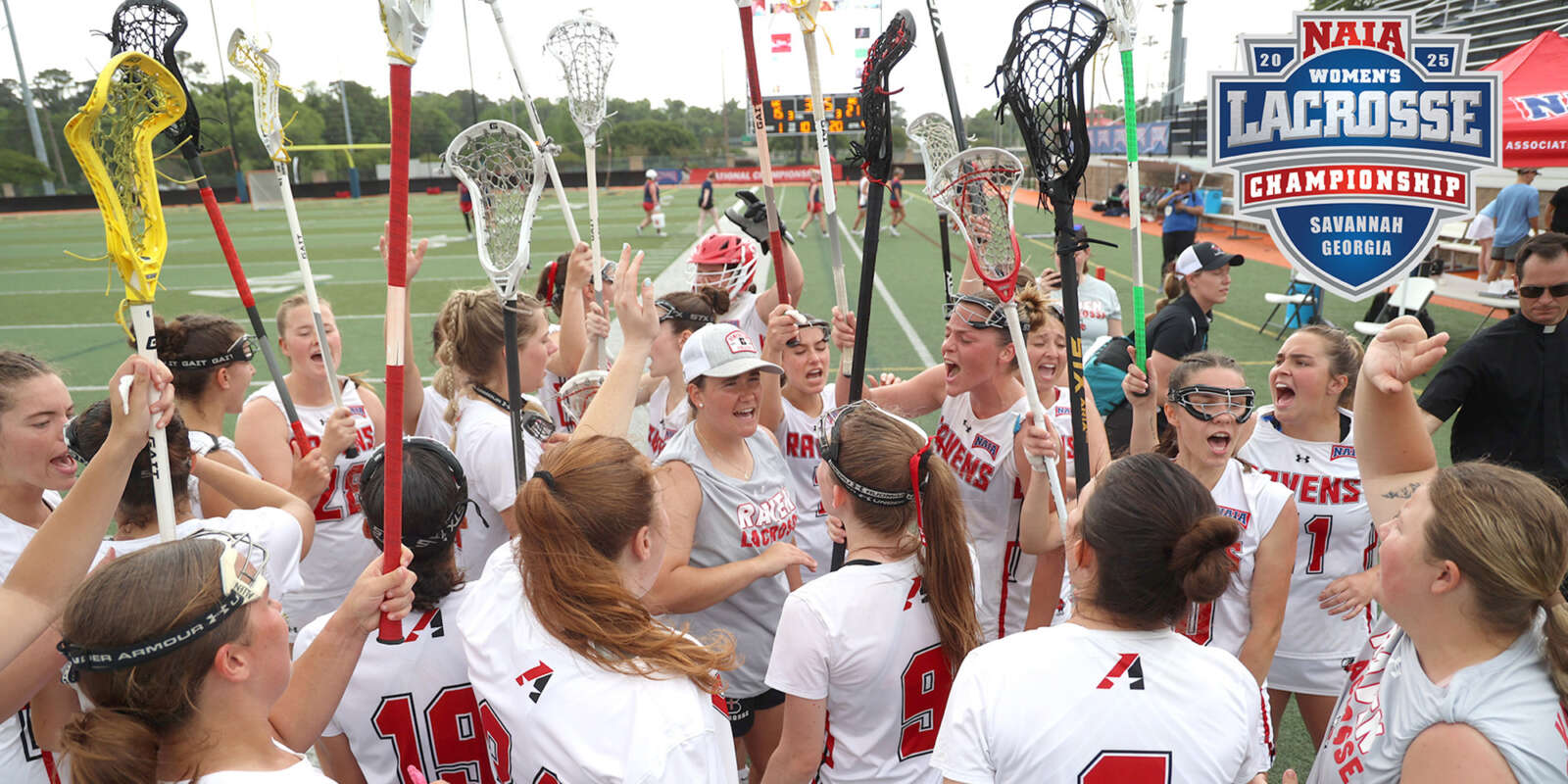 The 2025 NAIA Women's Lacrosse Championship team celebrates their win after the game