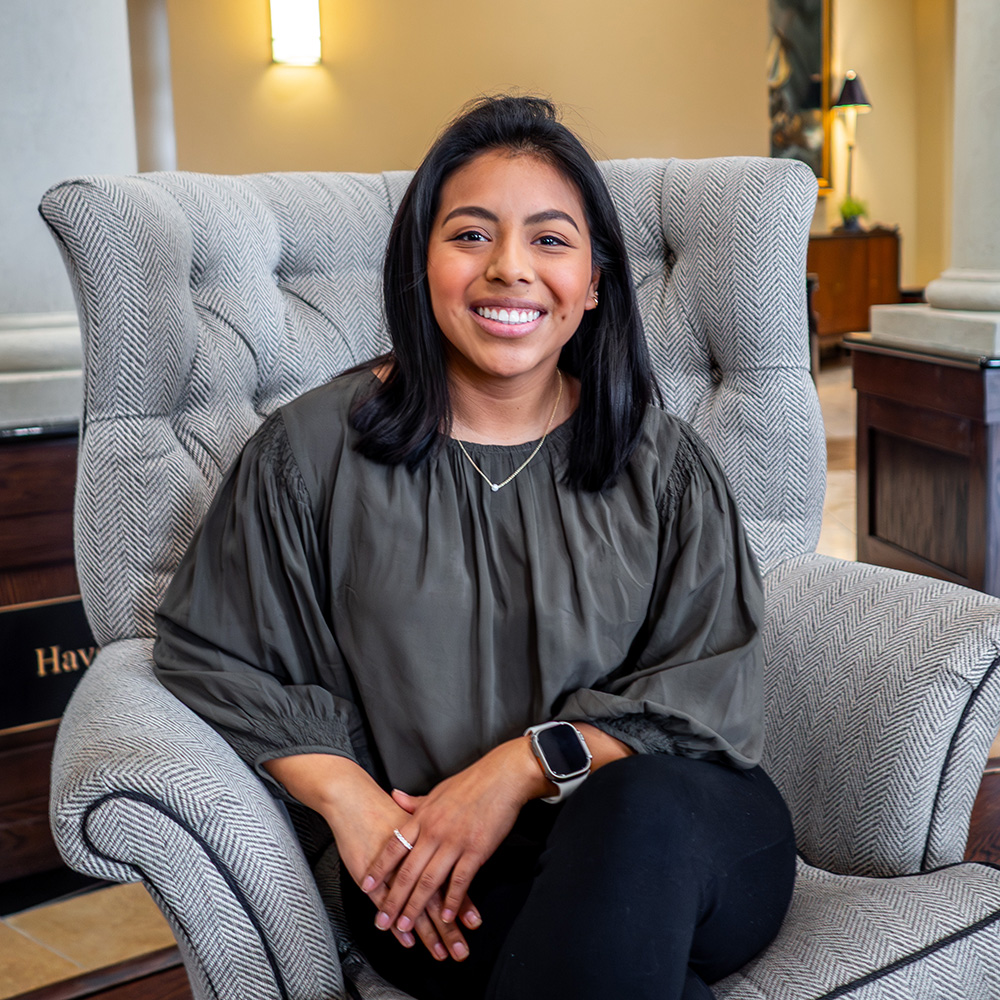 A student sits in a chair