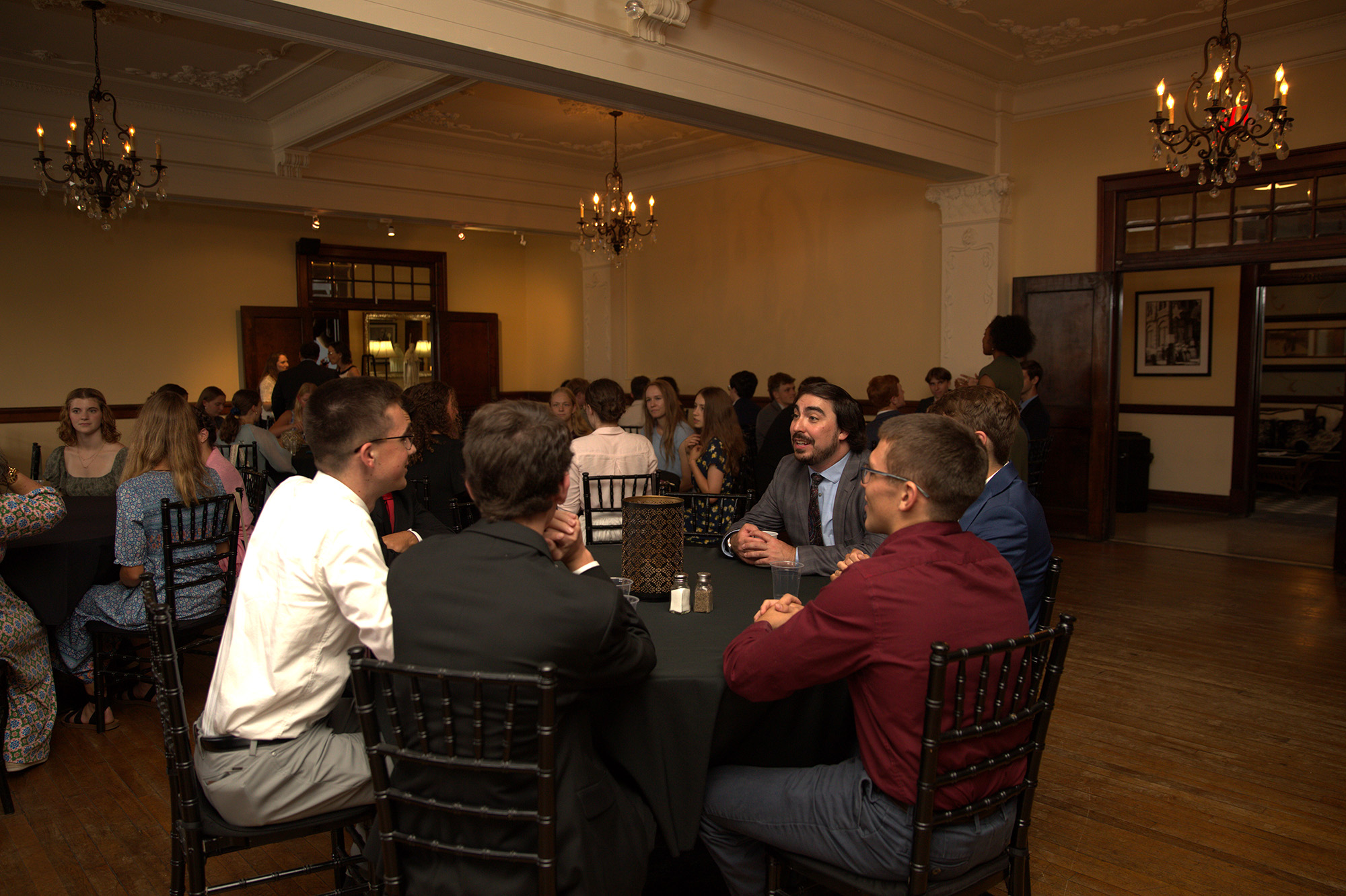 Honors students at dinner during their retreat