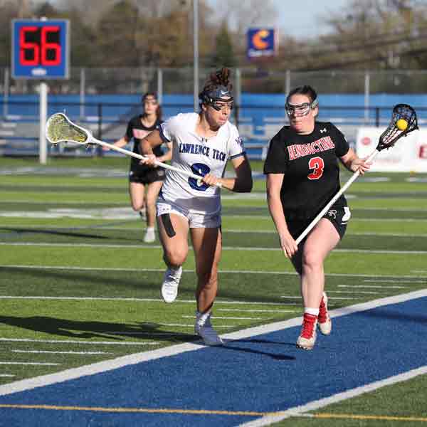 No. 3 Rianna England in possession of the ball during the 2022 NAIA Women's Lacrosse Championship game