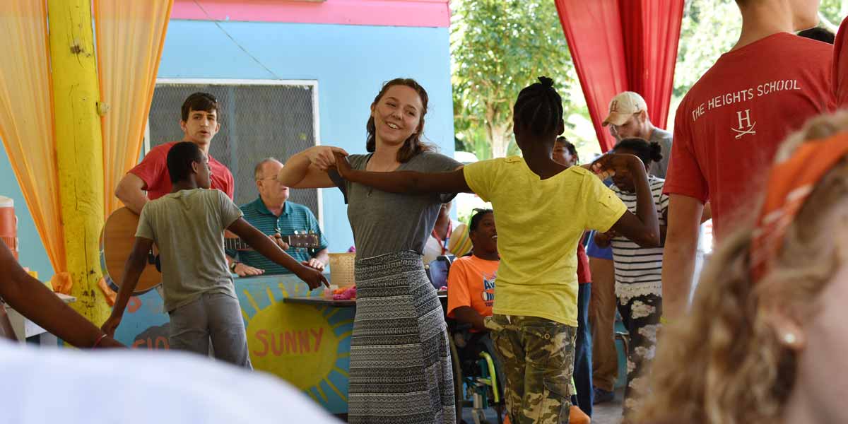 Dancing with children in Jamaica
